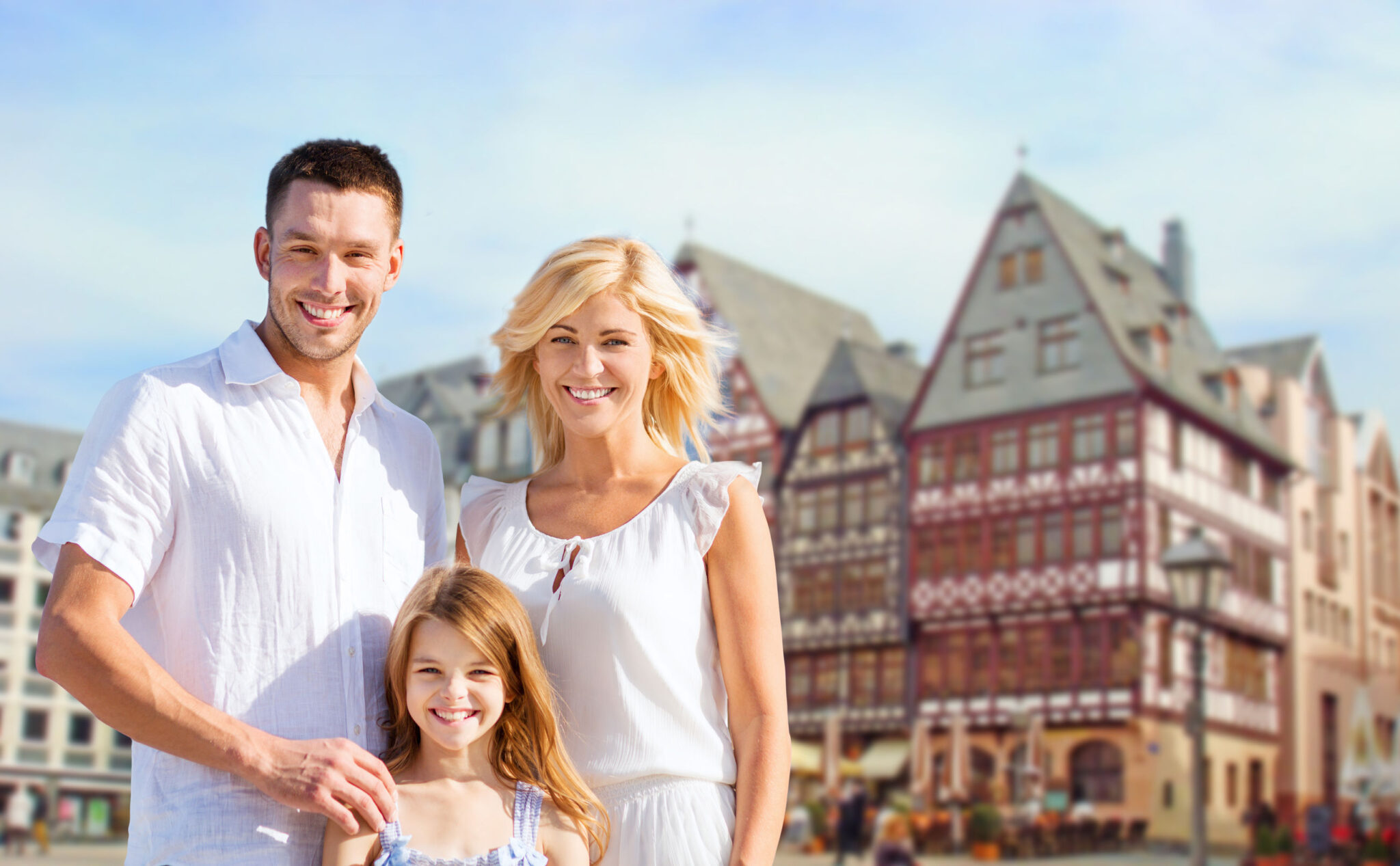 tourism, travel and people concept - happy family over frankfurt am main city background