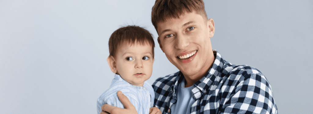 Young man with happy child