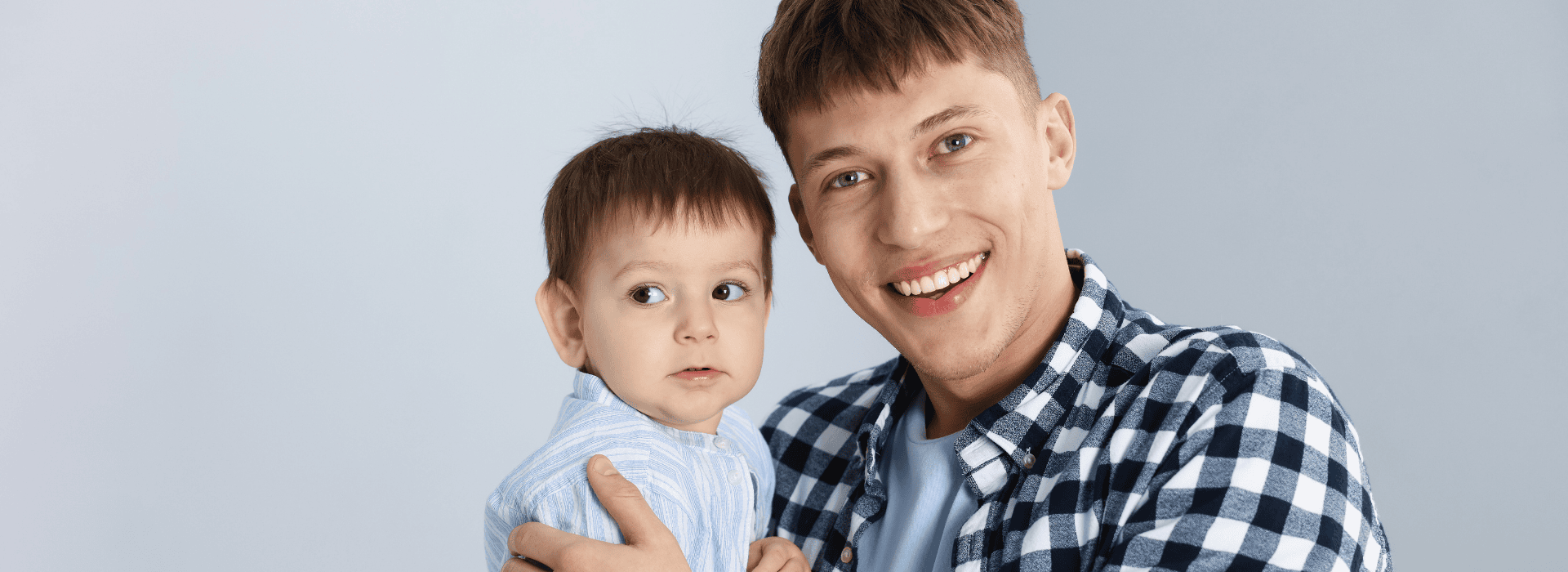 Young man with happy child
