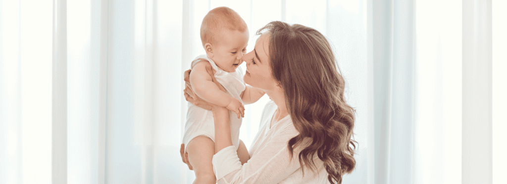 Rota nanny holding an infant