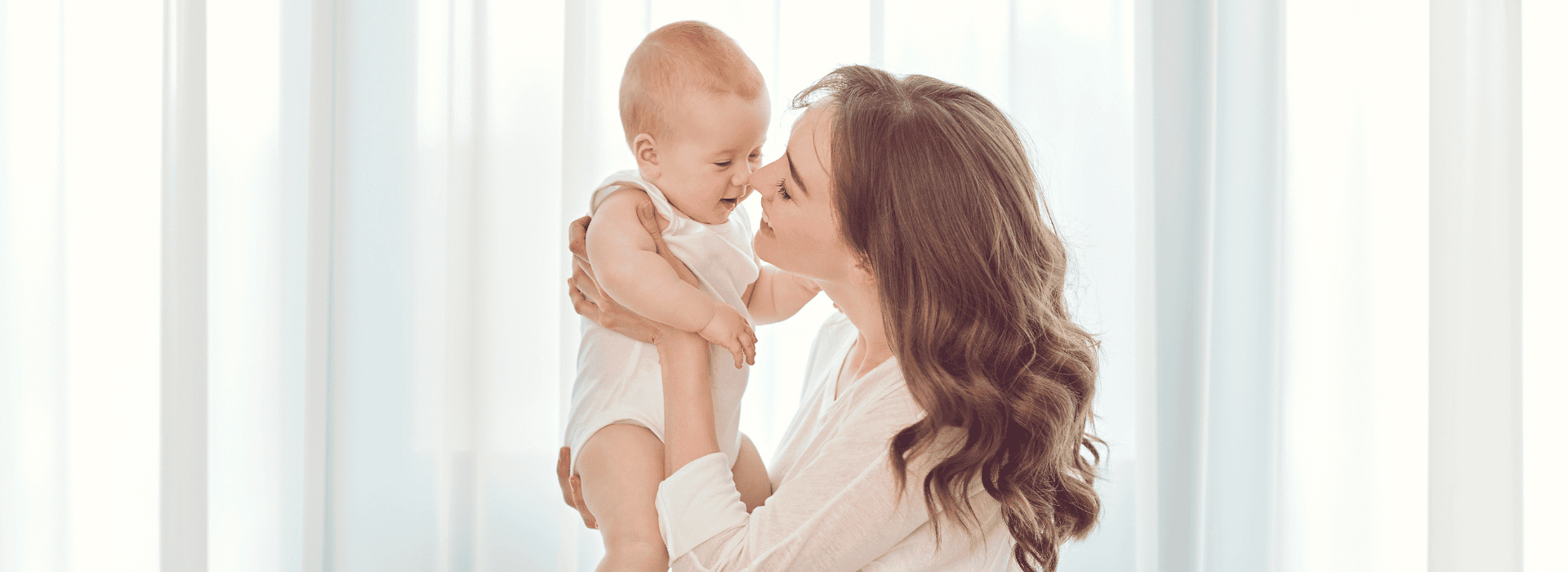Rota nanny holding an infant