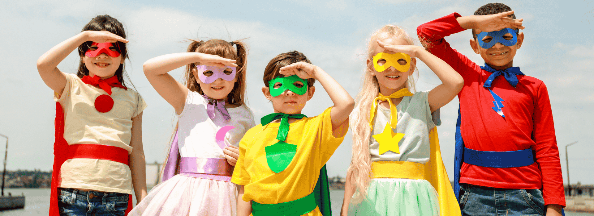 Kids in superhero costumes