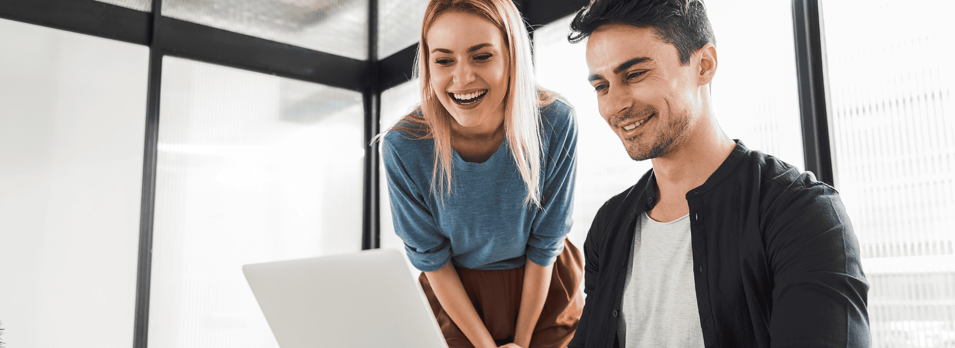 young couple choosing a nanny in an office