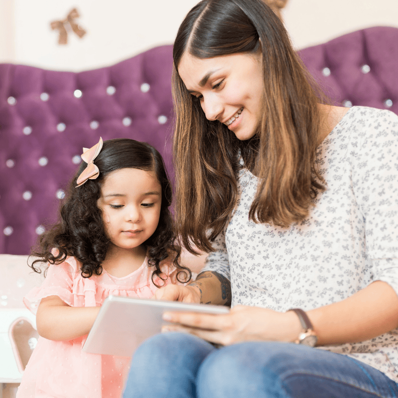 Nanny reading to child