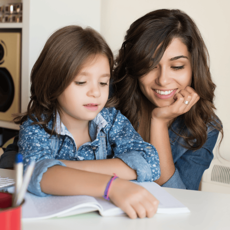Nanny and Child doing Homework
