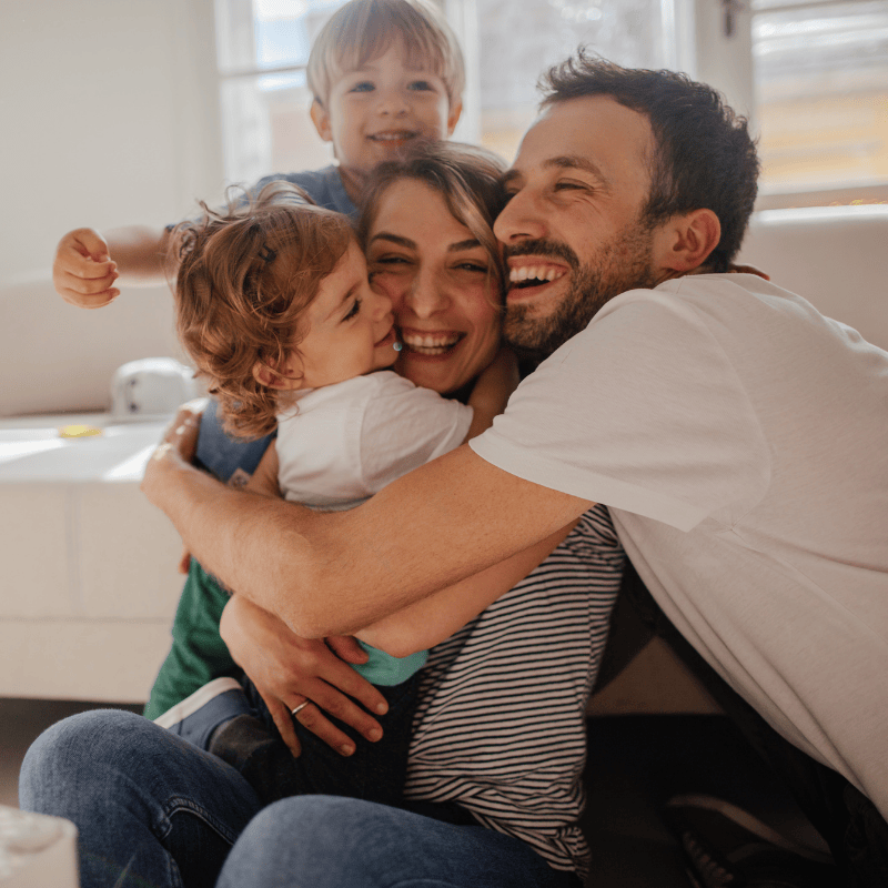 Parents and children hugging