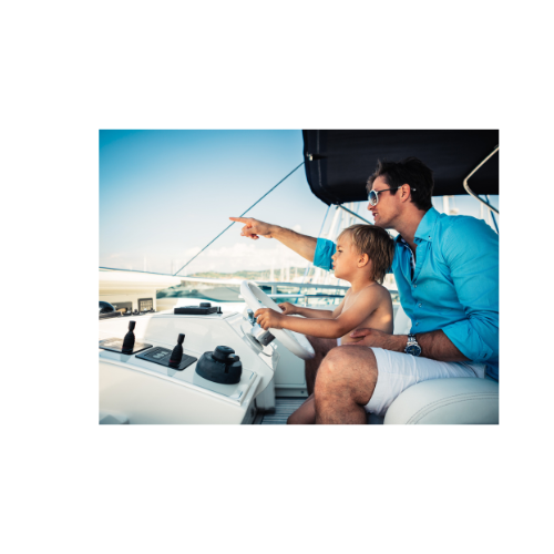 Father and young son on yacht